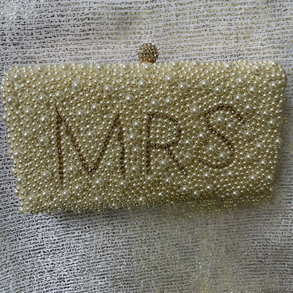 Elegant Cream Pearl Clutch
